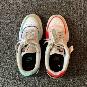 Nike Air Force 1 Low Shadow, one red and one blue, size 7